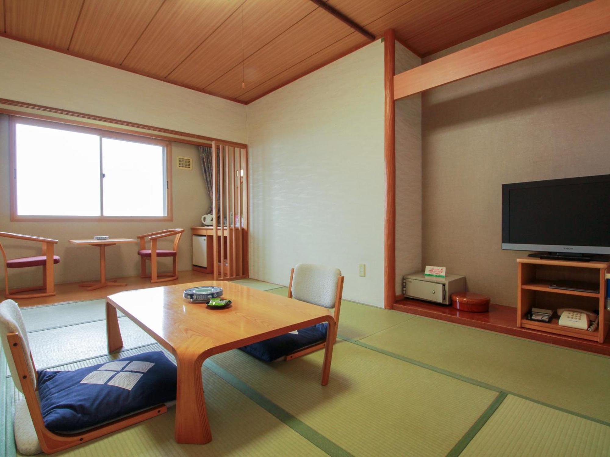Iwanai Kogen Hotel Rum bild